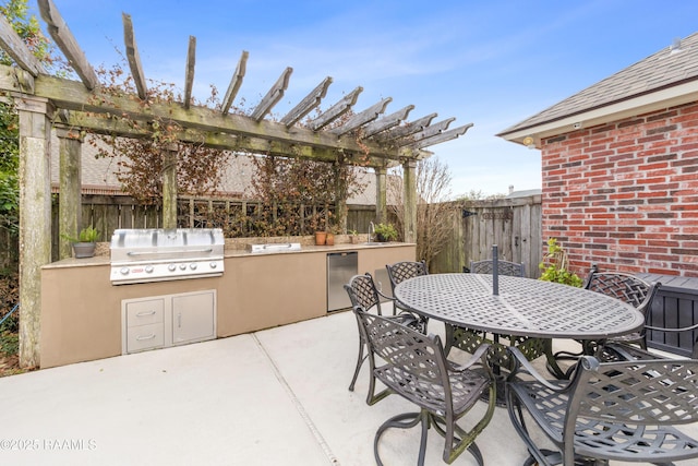 view of patio / terrace featuring an outdoor kitchen, a grill, and a pergola