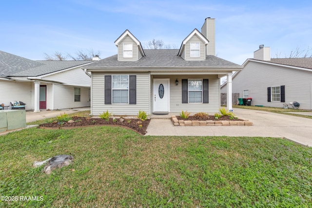 view of front of property with a porch and a front lawn