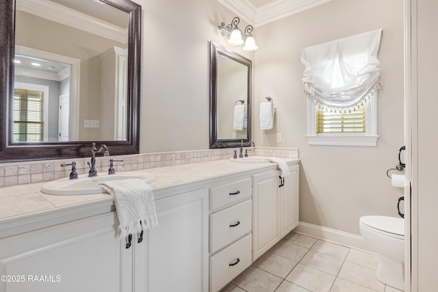 211 Bayonne Dr, Lafayette, LA 70507 - bathroom with ornamental molding, toilet, tile patterned flooring, double vanity, and baseboards