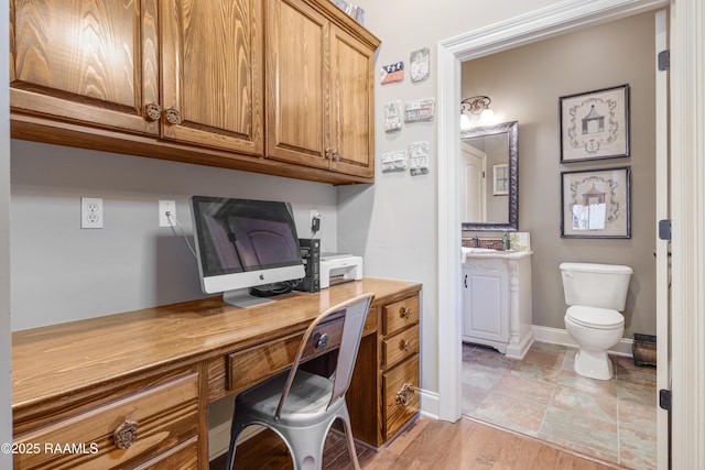 211 Bayonne Dr, Lafayette, LA 70507 - office featuring built in desk and baseboards