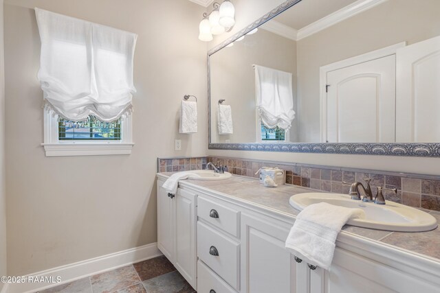 211 Bayonne Dr, Lafayette, LA 70507 - bathroom featuring ornamental molding, baseboards, double vanity, and decorative backsplash