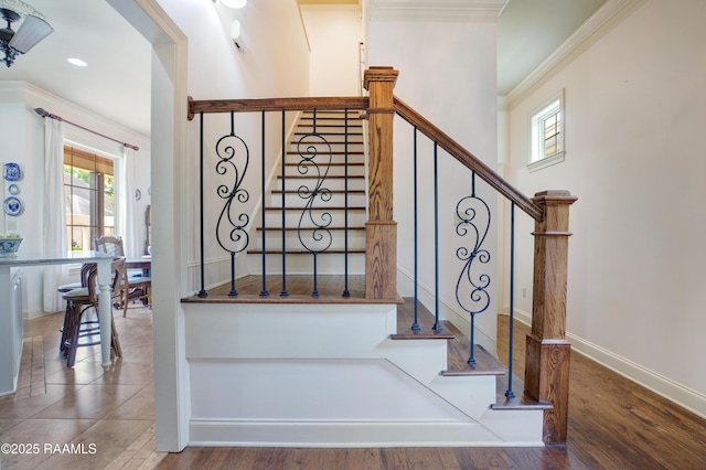 211 Bayonne Dr, Lafayette, LA 70507 - staircase featuring healthy amount of natural light, ornamental molding, baseboards, and recessed lighting