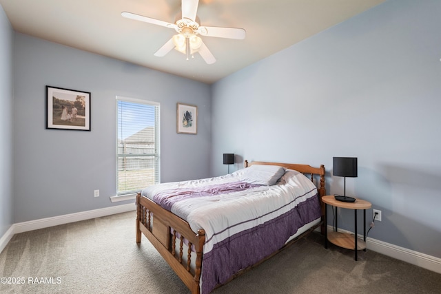 bedroom with dark colored carpet and ceiling fan