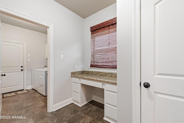 bathroom featuring vanity and washer and dryer