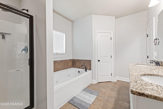 bathroom featuring vanity and shower with separate bathtub