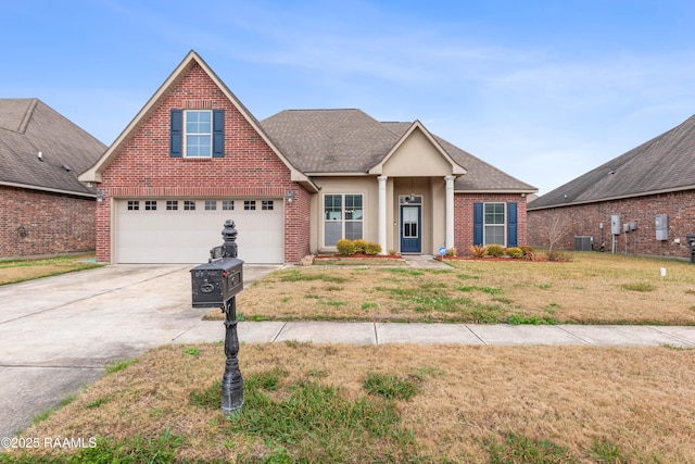 view of front of home with a garage, a front yard, and central air condition unit