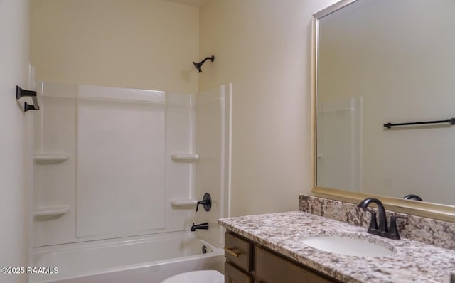 full bathroom featuring vanity, shower / tub combination, and toilet