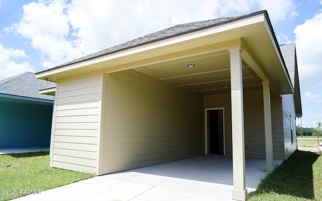 exterior space featuring a carport