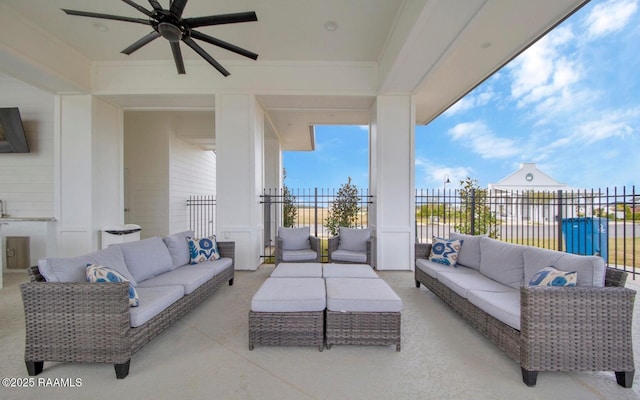 view of patio / terrace with ceiling fan and an outdoor living space