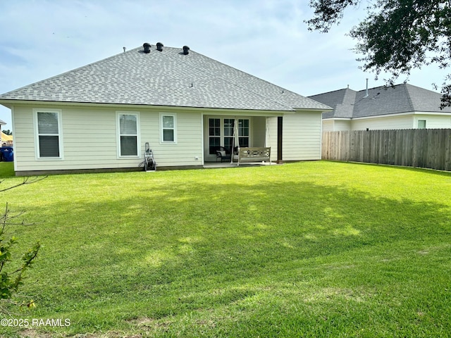 206 Earls Ct, Maurice, LA 70555 - back of house with a shingled roof and a patio area