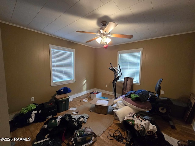 interior space with hardwood / wood-style floors and ornamental molding