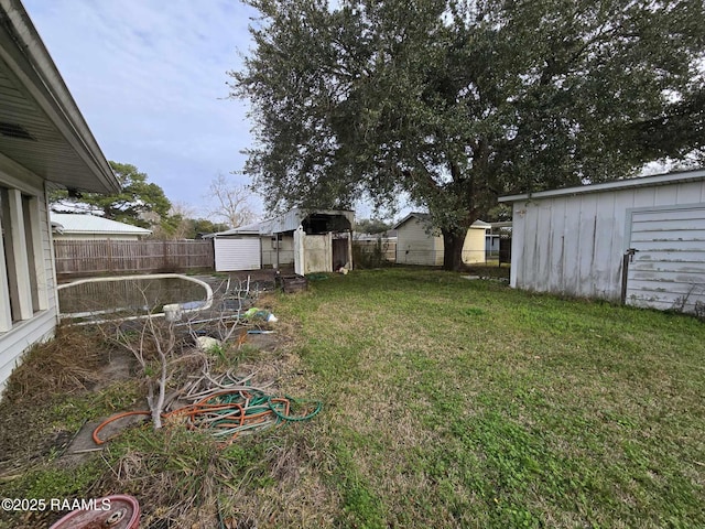 view of yard featuring a storage shed