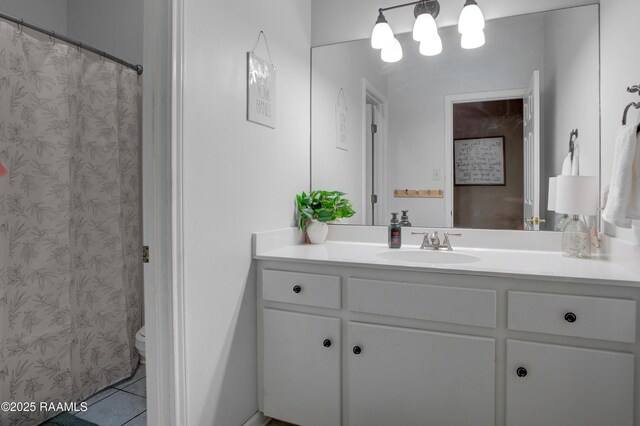 full bath featuring toilet, a shower with shower curtain, tile patterned flooring, and vanity