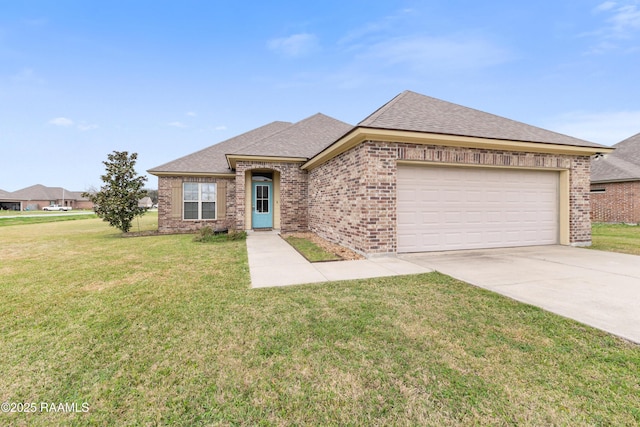 view of front facade featuring a garage and a front lawn