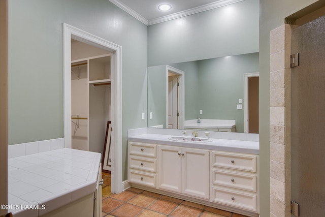 bathroom with vanity, a shower stall, recessed lighting, and ornamental molding