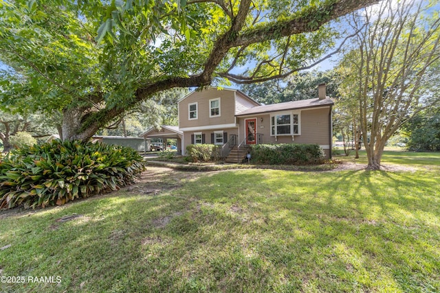 view of front of property with a front lawn