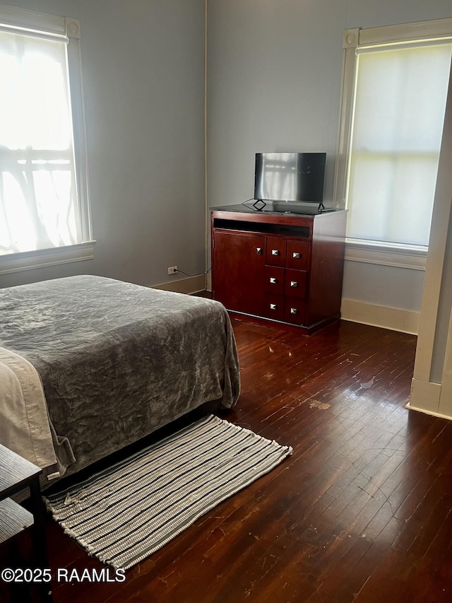 bedroom featuring dark hardwood / wood-style floors