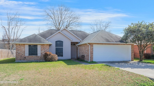 ranch-style house with a garage and a front lawn