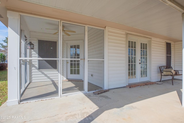 view of patio featuring ceiling fan and french doors