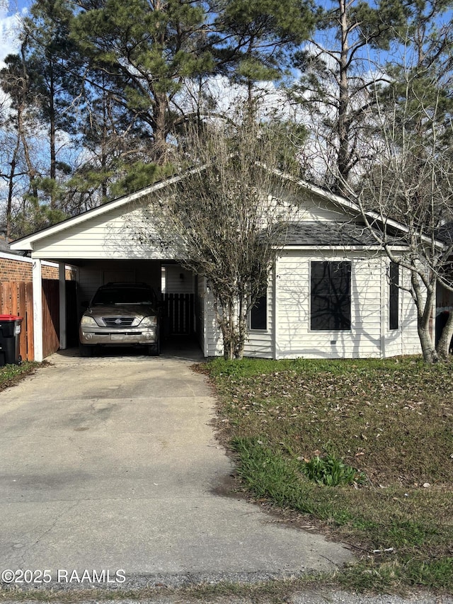 view of front of house with a carport