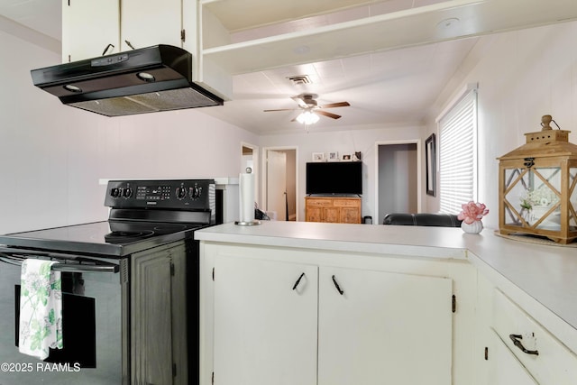 kitchen with extractor fan, a peninsula, white cabinets, light countertops, and black electric range oven