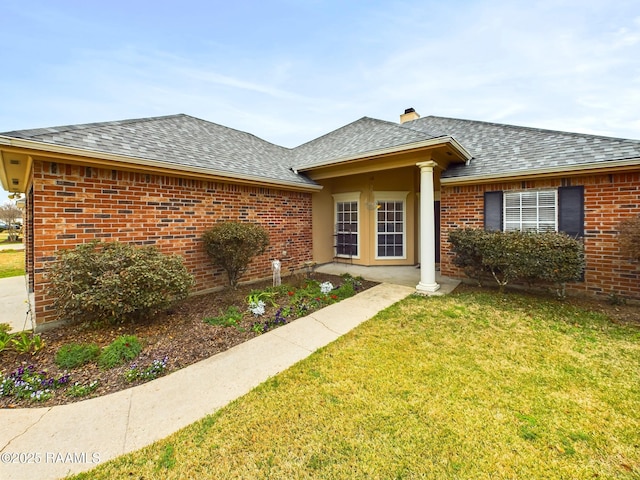 ranch-style house with a front yard