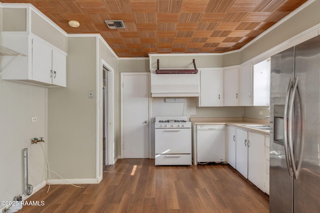 316 Kim Dr, Lafayette, LA 70503 - kitchen with white appliances, visible vents, white cabinetry, and light countertops