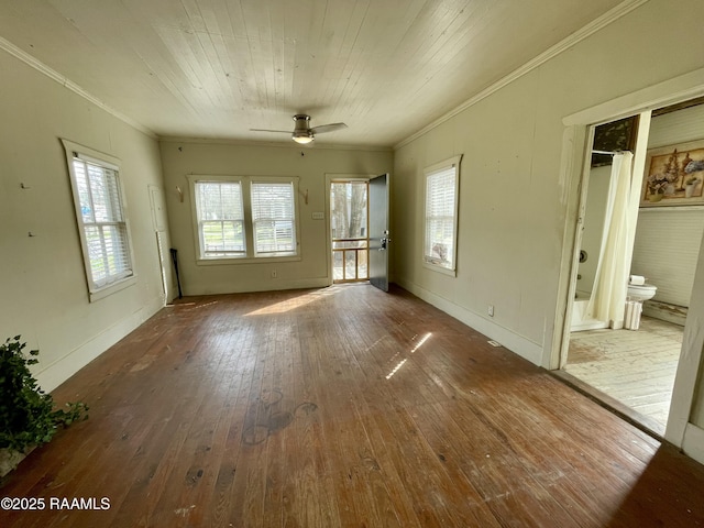 unfurnished living room featuring wooden ceiling, a ceiling fan, wood-type flooring, and ornamental molding