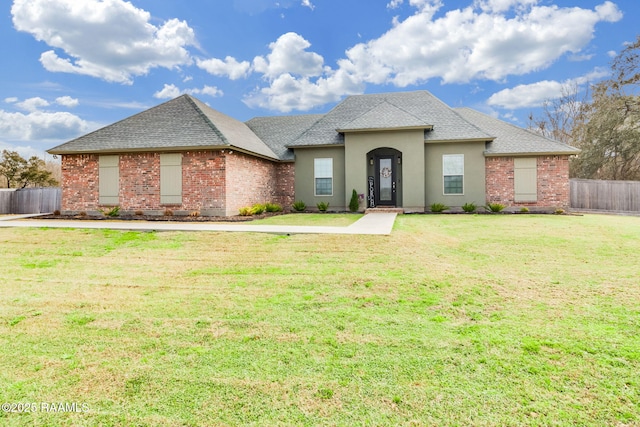 view of front of home with a front lawn