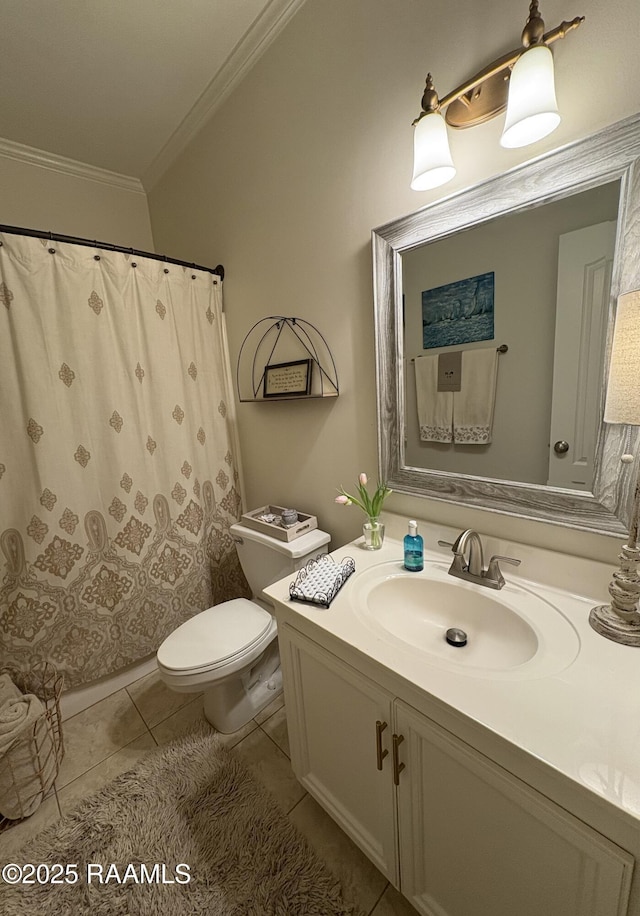 bathroom with tile patterned floors, ornamental molding, toilet, and vanity