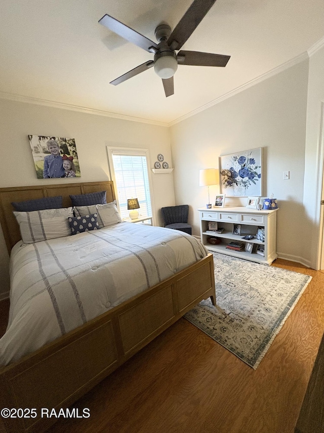 bedroom featuring crown molding, ceiling fan, and dark hardwood / wood-style floors