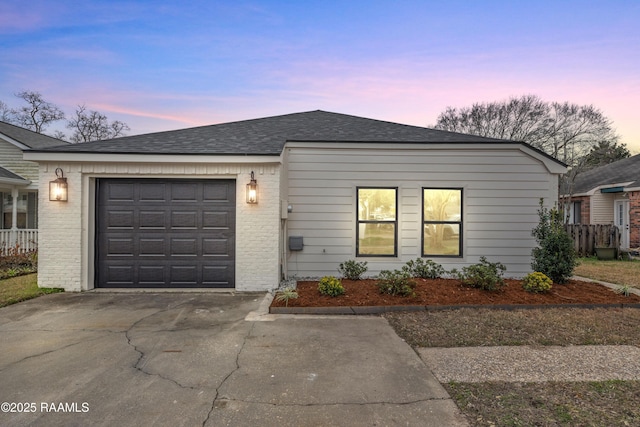 view of front of property featuring a garage