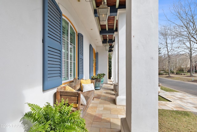 entrance to property featuring covered porch