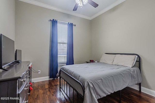 bedroom with ceiling fan, wood finished floors, baseboards, and ornamental molding