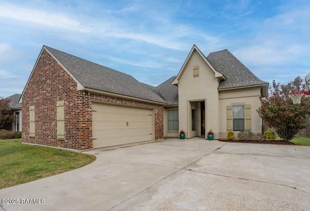 view of front of home with brick siding, driveway, a shingled roof, and a garage