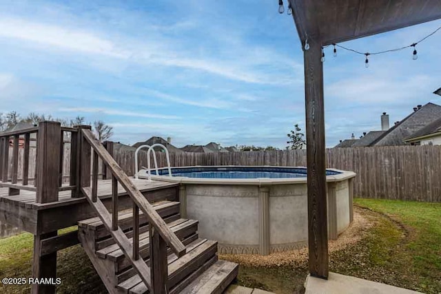 view of pool featuring a fenced in pool and a fenced backyard