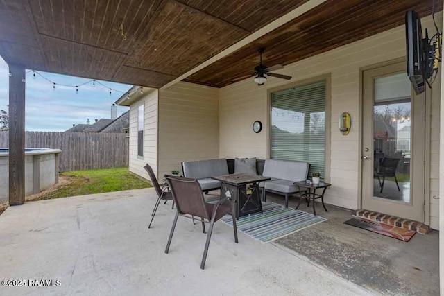 view of patio / terrace featuring a fenced in pool, an outdoor living space with a fire pit, ceiling fan, and fence