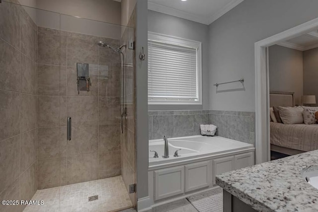 full bathroom featuring vanity, ensuite bath, a shower stall, crown molding, and a bath