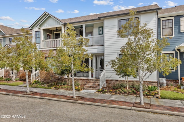 view of property with a balcony