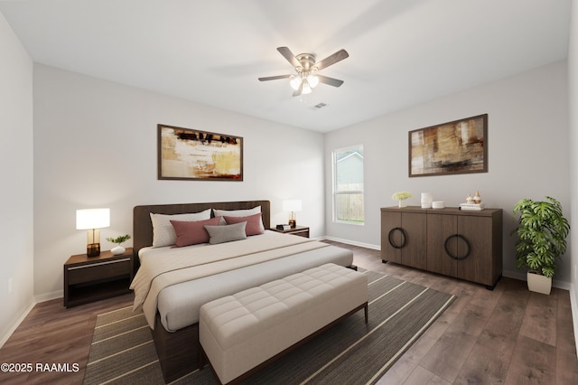 bedroom with ceiling fan and dark hardwood / wood-style flooring