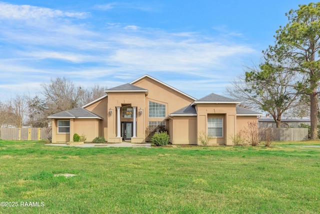 ranch-style home featuring a front yard