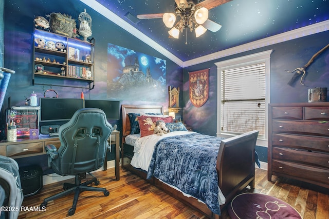 bedroom with lofted ceiling, ornamental molding, and wood-type flooring