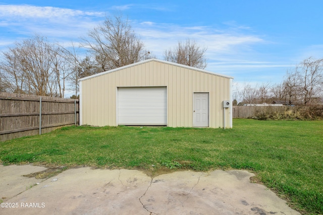 garage with a yard