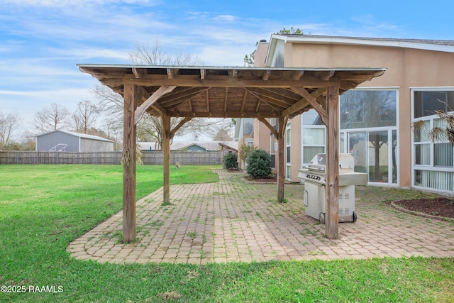 view of patio / terrace featuring a grill and a gazebo