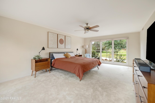 bedroom with ceiling fan and light colored carpet