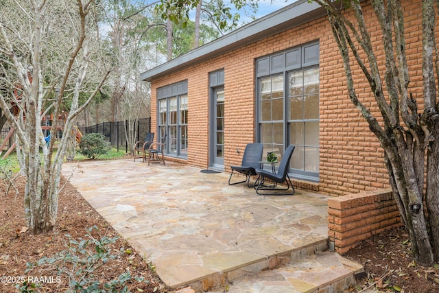 view of patio / terrace with fence