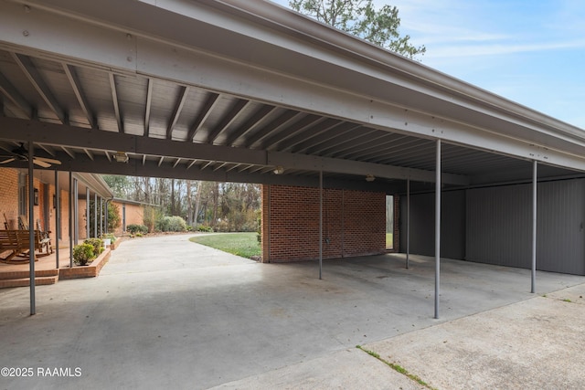 view of vehicle parking with a carport