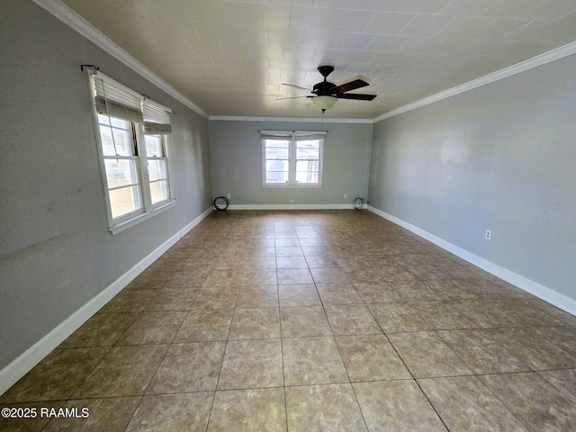 tiled spare room featuring ceiling fan and crown molding