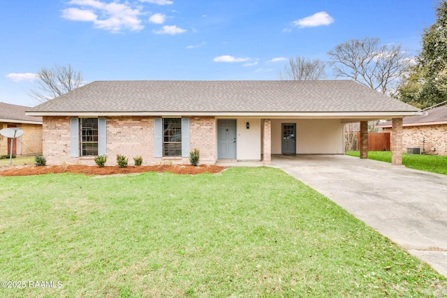 single story home with a carport, central AC unit, and a front yard