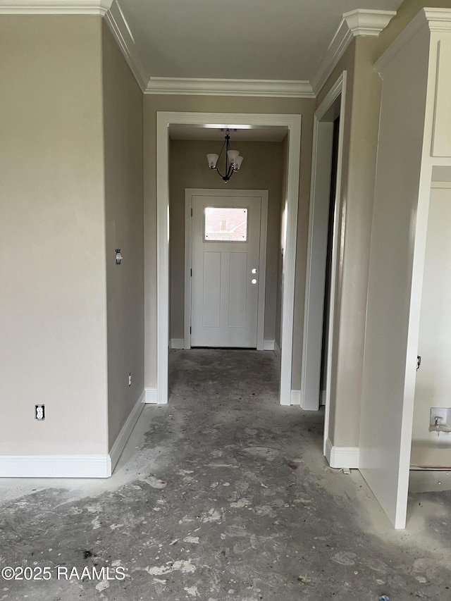 hall with crown molding and a chandelier